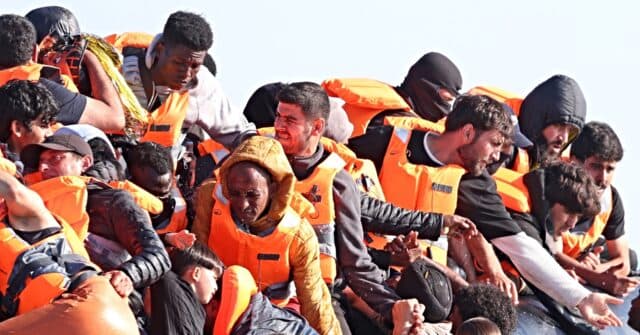 Record 230-Migrant Dinghy Crossing Reignites UK Channel Crisis Debate